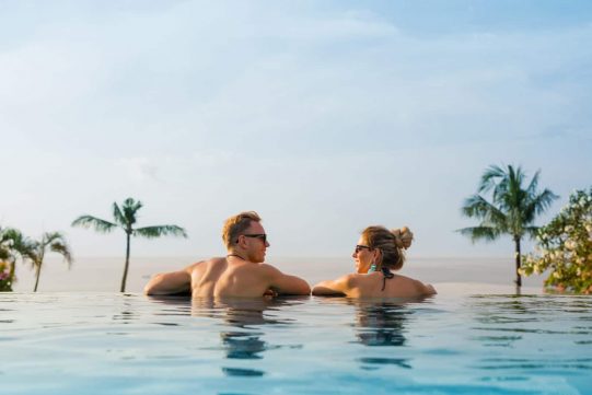 Couple Swimming In Venice Slimline Pool